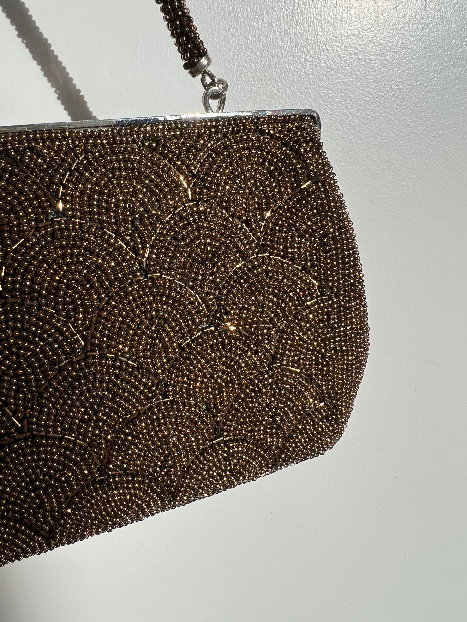 Vintage bronze beaded bag close up